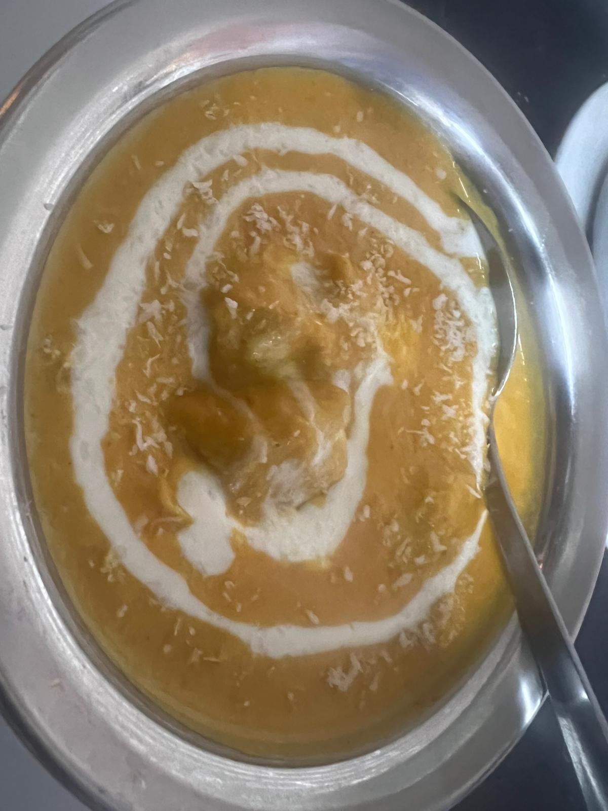 A creamy curry served in a traditional dish