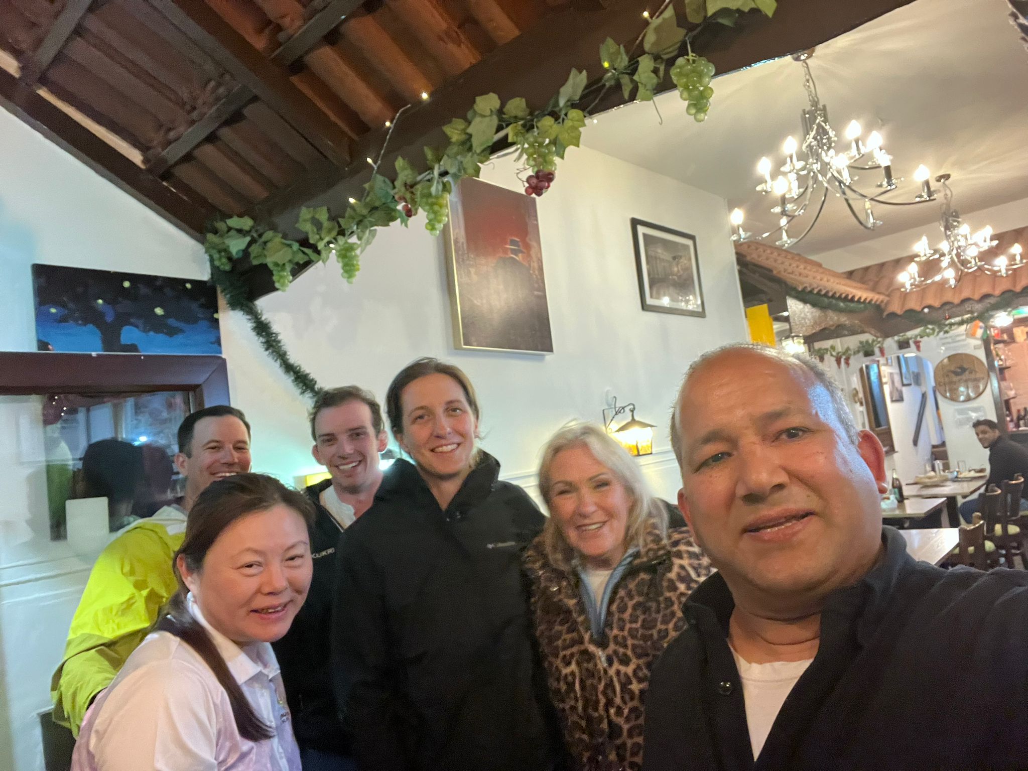 Curry Cottage staff sharing a photo with guests